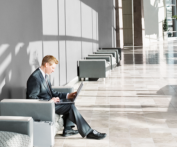 business-mann-laptop-lobby