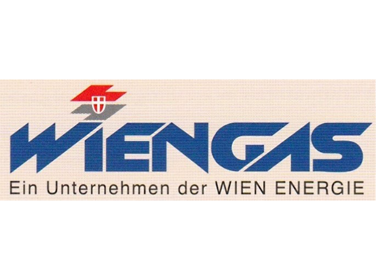 Logo von WIENGAS mit Text: „Ein Unternehmen der WIEN ENERGIE“ auf beigem Hintergrund.