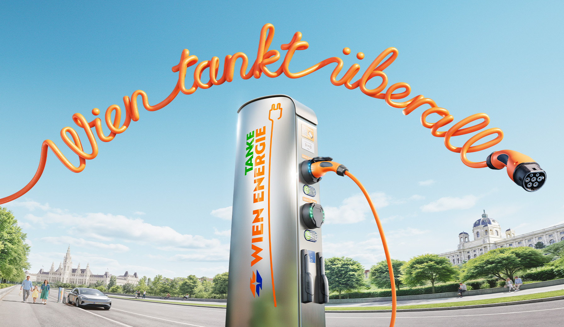 Elektroauto-Ladestation mit orangefarbenem Kabel mit dem Schriftzug "Wien tankt überall" vor einem Wiener Wahrzeichen.