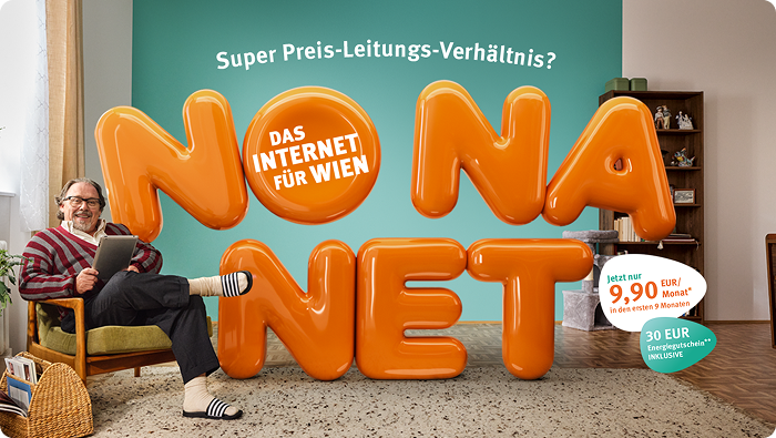 Ein Mann in einem Sessel, umgeben von großen orangefarbenen Luftballons, auf denen „NONA NET“ und „DAS INTERNET FÜR WIEN“ steht.